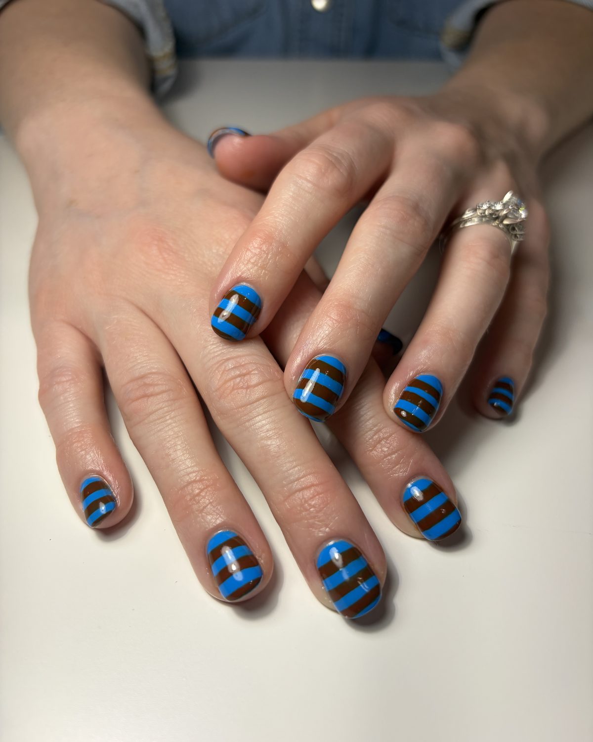 Hand-painted blue and brown stripes.